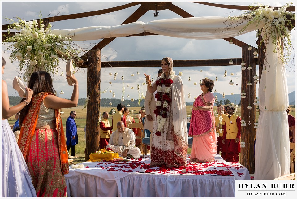 spruce mountain ranch wedding indian wedding wedding ceremony groom's shoes are stolen