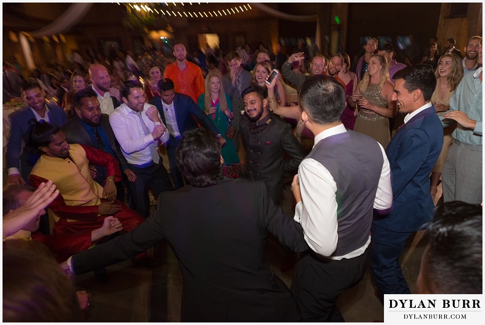 spruce mountain ranch wedding indian wedding groom dancing and the party begins