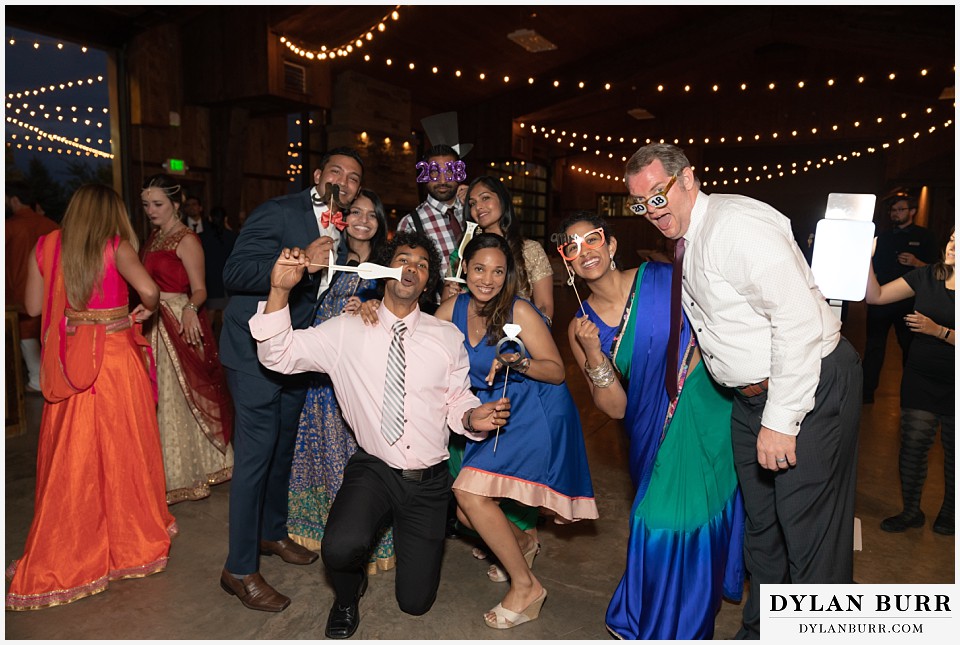 spruce mountain ranch wedding indian wedding wedding guests posing for a candid photo