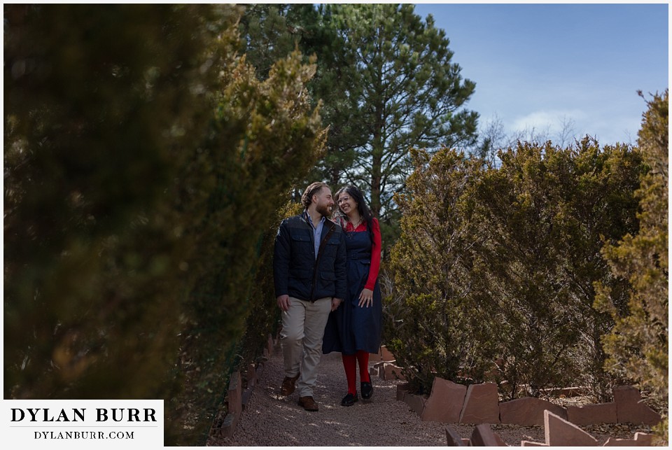 engagement proposal couple walking the stanley hedge maze