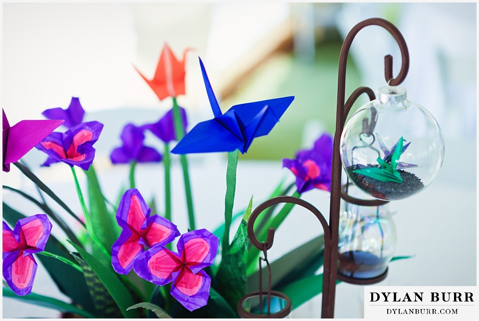 stone mountain lodge wedding origami centerpiece paper bird cranes in glass globes