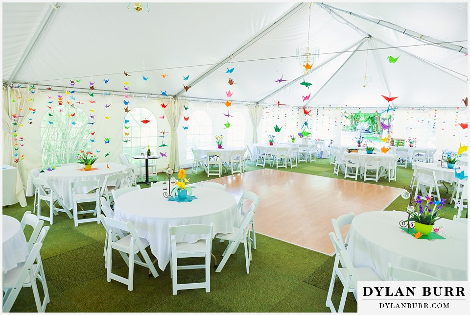 stone mountain lodge wedding wide shot showing table centerpieces and origami details