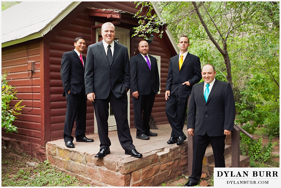 stone mountain lodge wedding groom and groomsmen near cabin