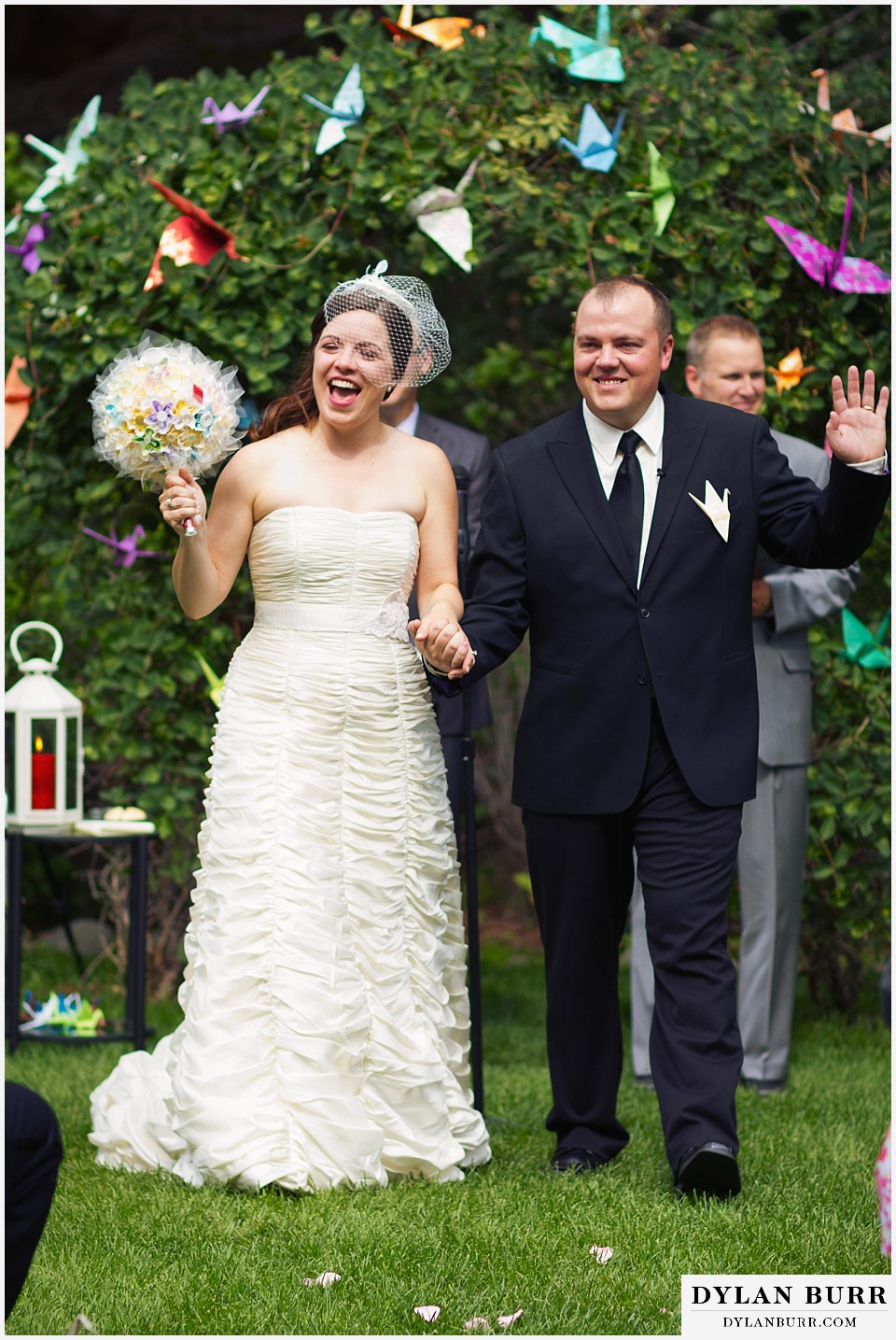 stone mountain lodge wedding happy bride and groom walking out of ceremony