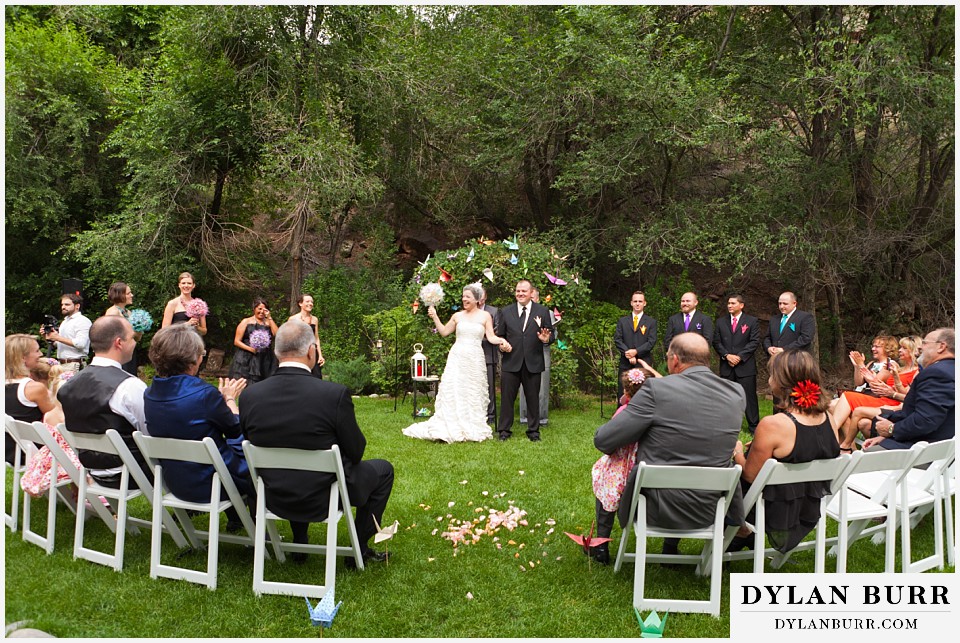 stone mountain lodge wedding wide ceremony view of bride and groom leaving ceremony