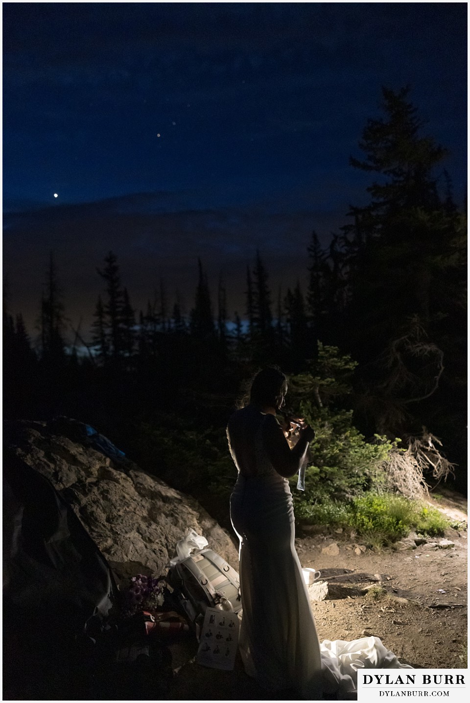 sunrise hike elopement to dream lake getting ready with stars in the sky