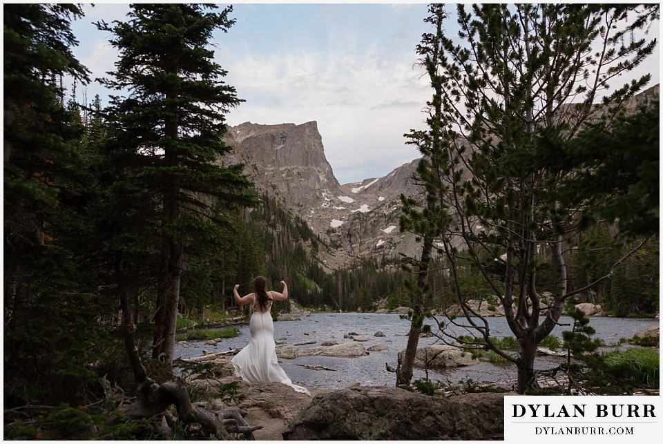 sunrise hike elopement to dream lake tough bride