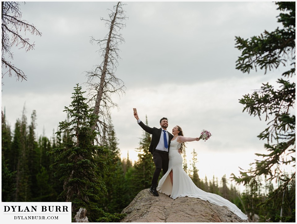 sunrise hike elopement to dream lake just married newlyweds