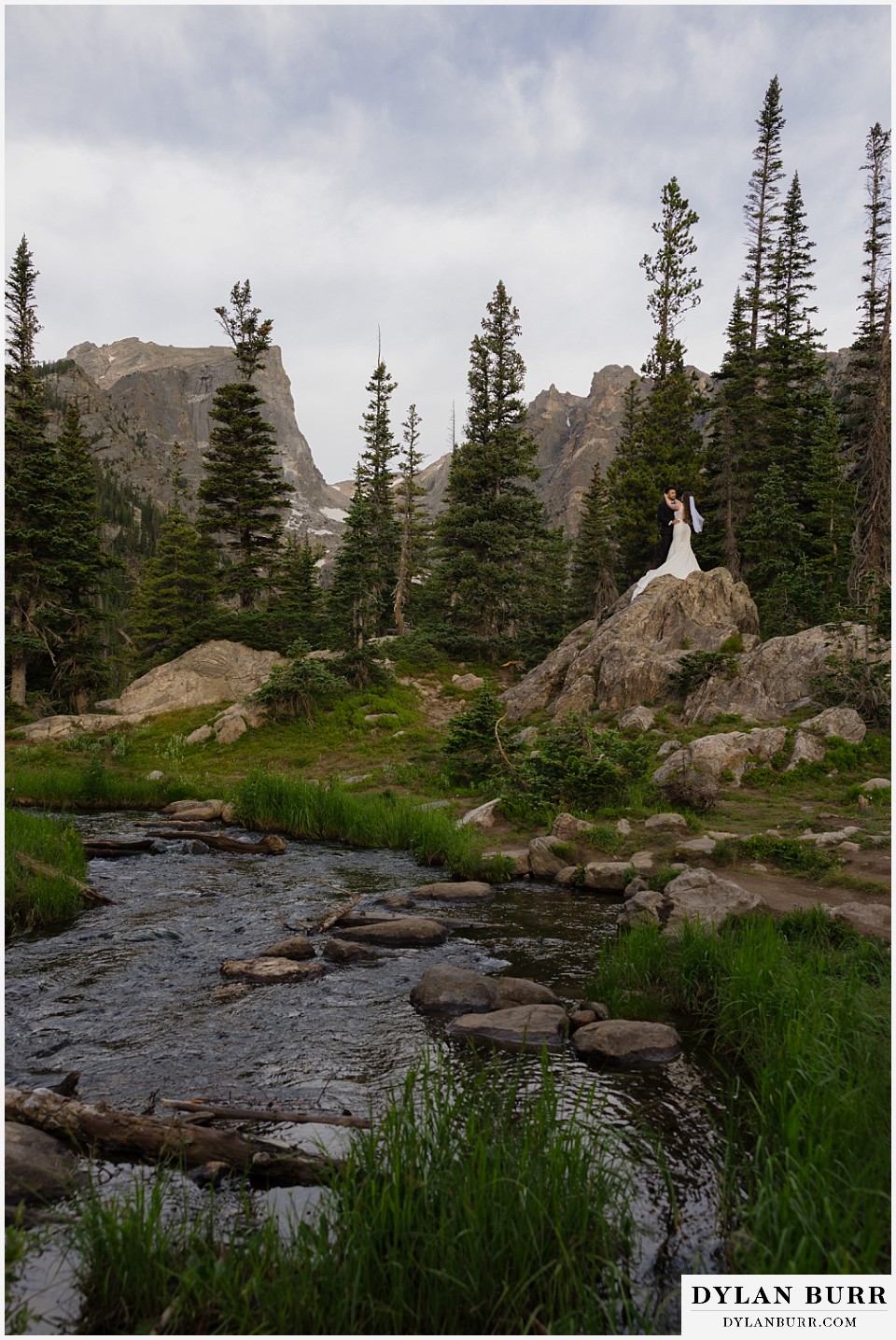 sunrise hike elopement to dream lake amazing view of hallett peak and the creek
