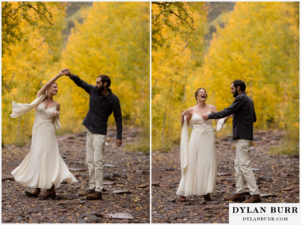 telluride elopement wedding dancing together in the yellow aspen trees