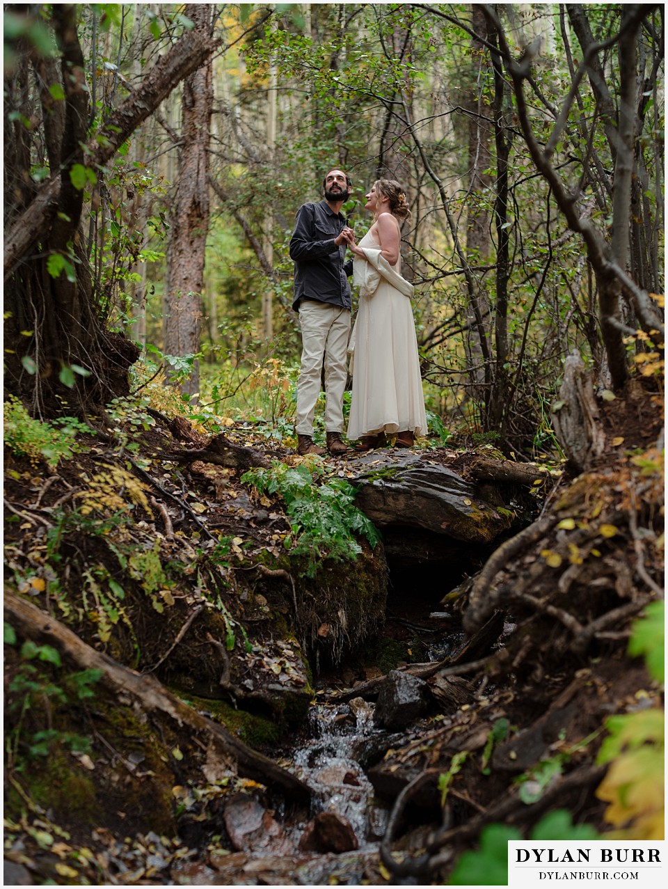 telluride elopement wedding bride and groom at mini waterfall