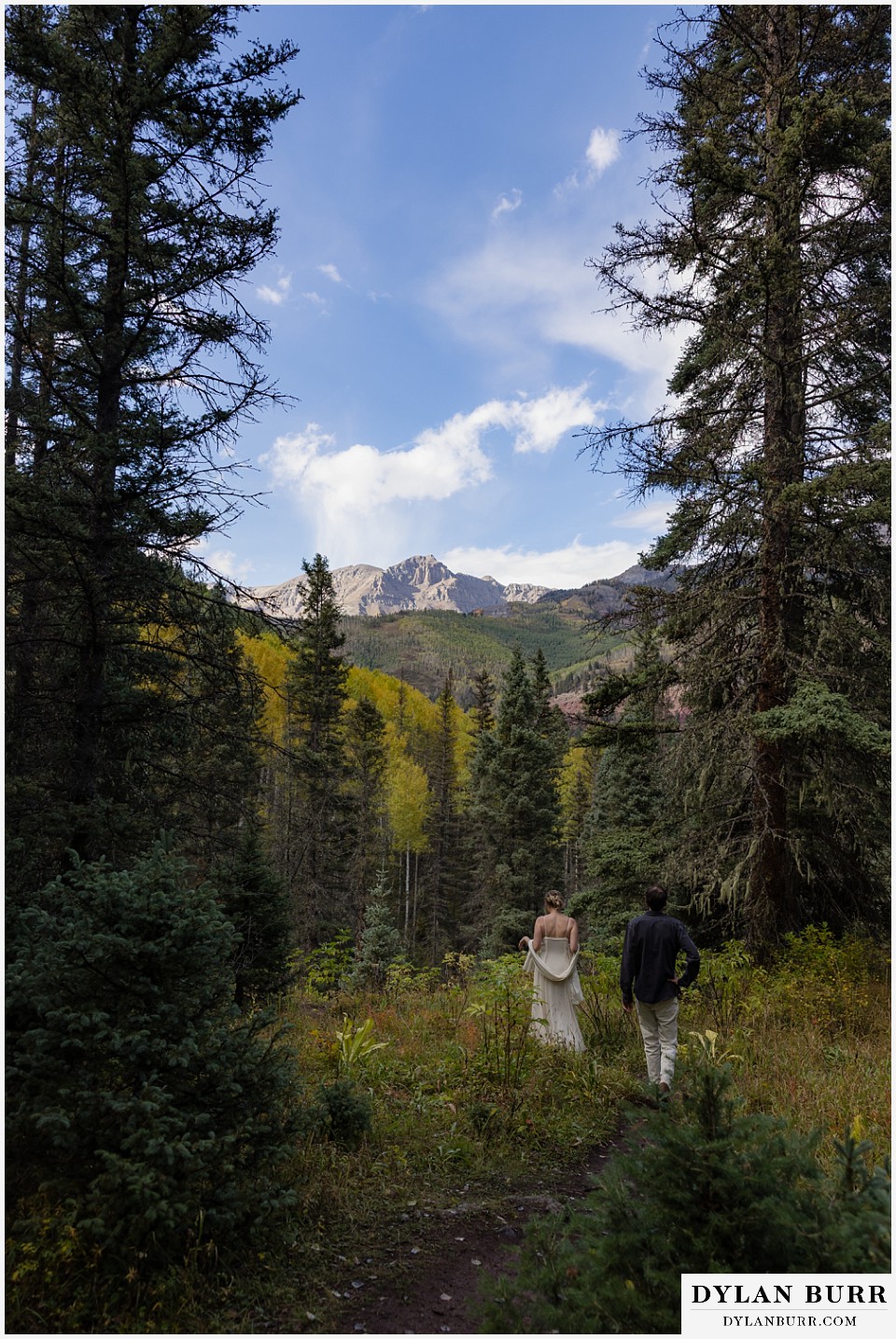 telluride elopement wedding couple hiking in mountains together
