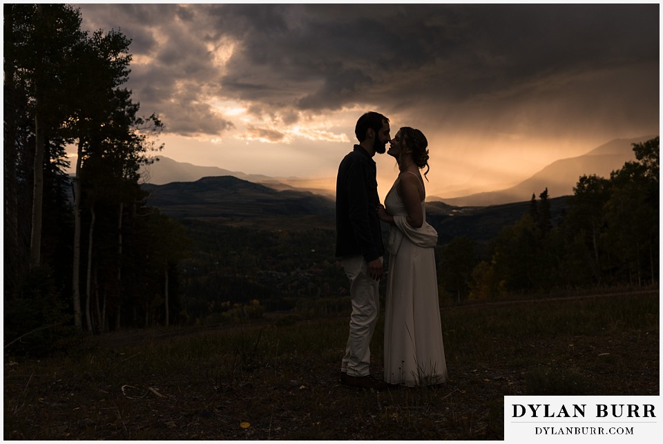 telluride elopement wedding couple almost in silhouette during sunset