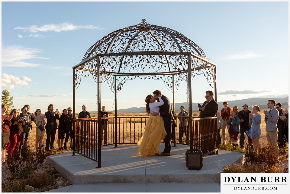 the covey fort collins wedding venue wedding ceremony at sunset in fall