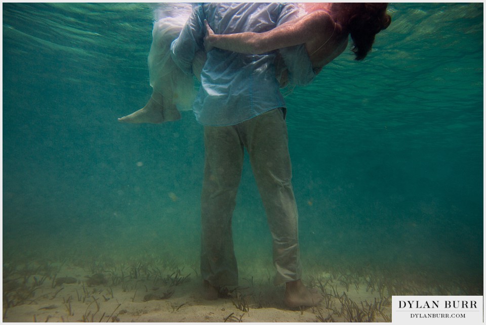 underwater wedding photography turks caicos carry wife