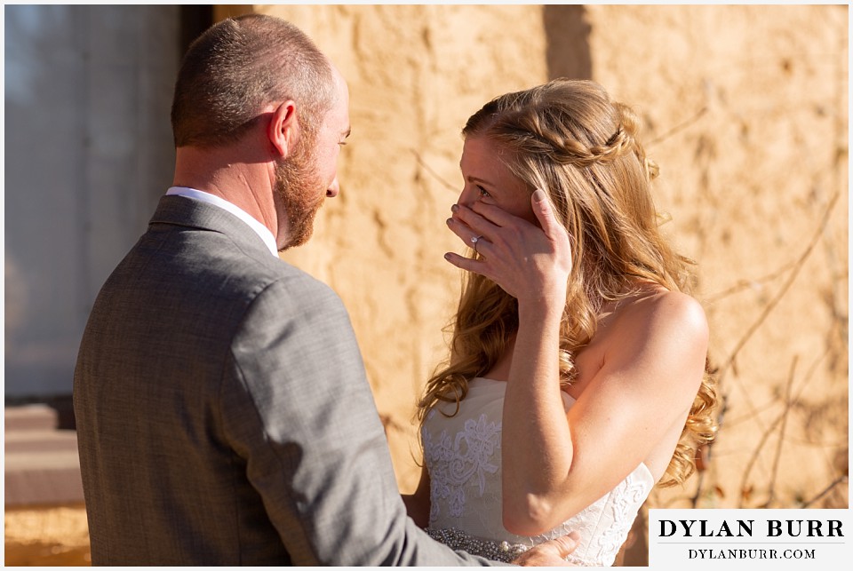 villa parker wedding parker colorado bride wiping a tear