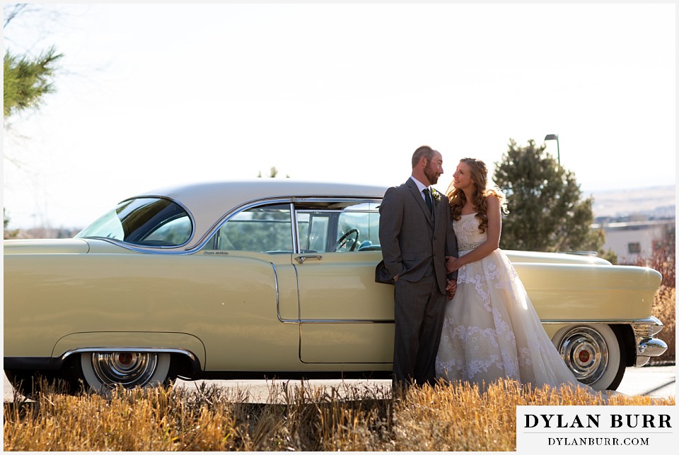 villa parker wedding parker colorado bride and groom ready to ride in the Cadillac