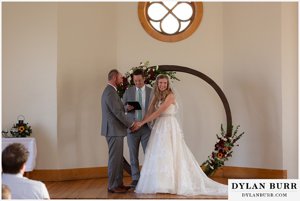 villa parker wedding parker colorado bride and groom together on stage