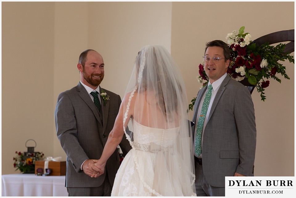 villa parker wedding parker colorado groom laughing and loving bride