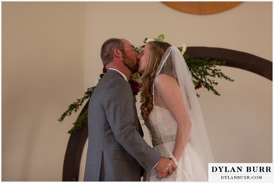 villa parker wedding parker colorado bride and groom first kiss