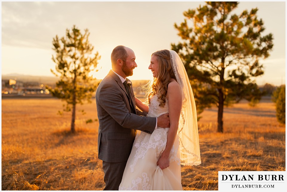 villa parker wedding parker colorado bride and groom laughing together