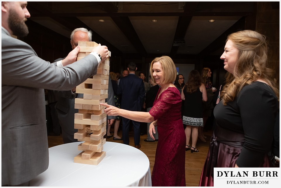 villa parker wedding parker colorado mom grabbing jenga piece