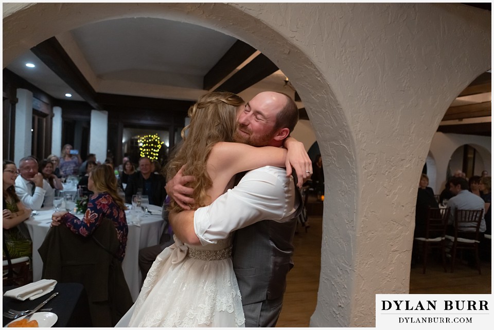 villa parker wedding parker colorado bride and groom big hugs