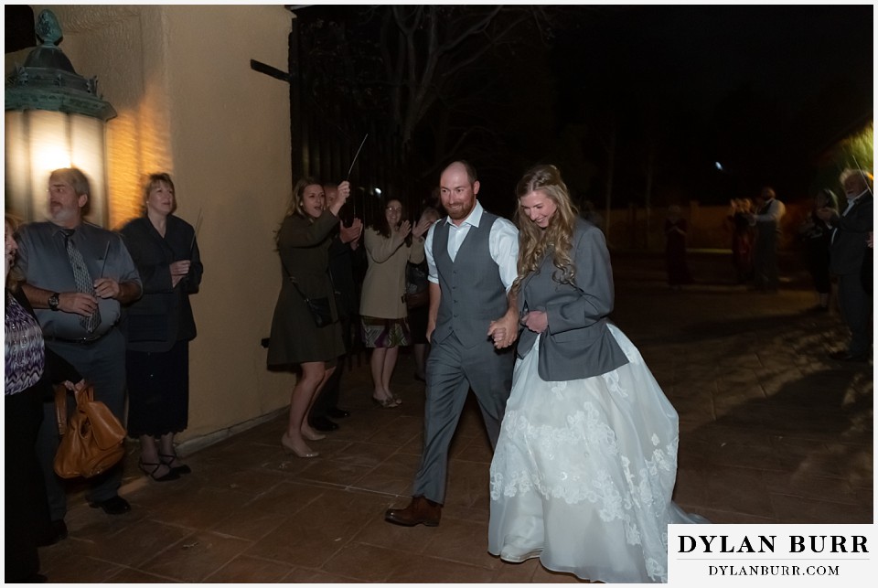 villa parker wedding parker colorado bride and groom exiting villa parker wedding venue