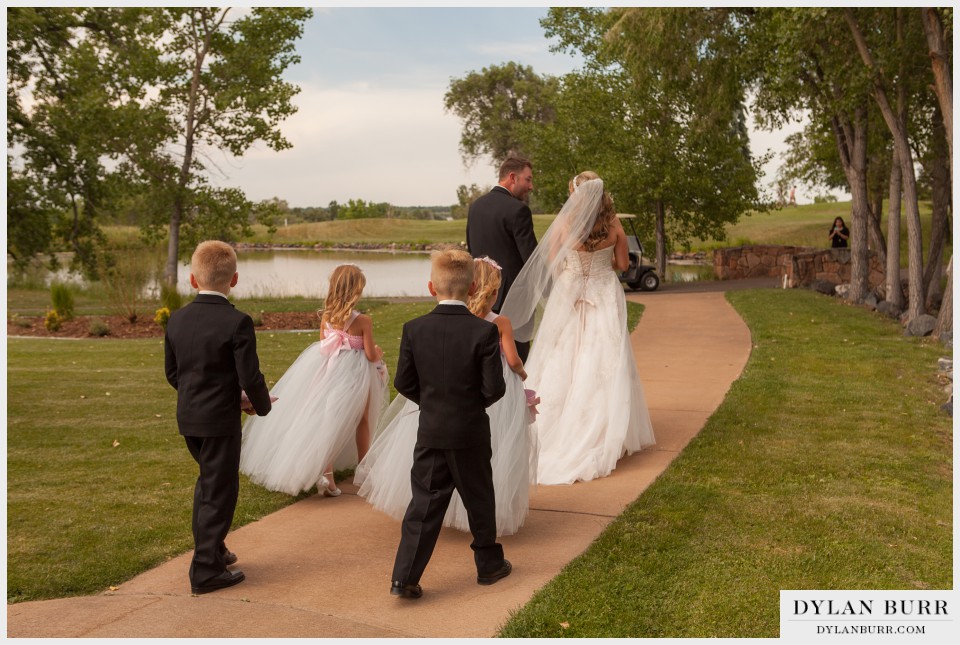 denver wedding photographer vista at applewood ceremony exit