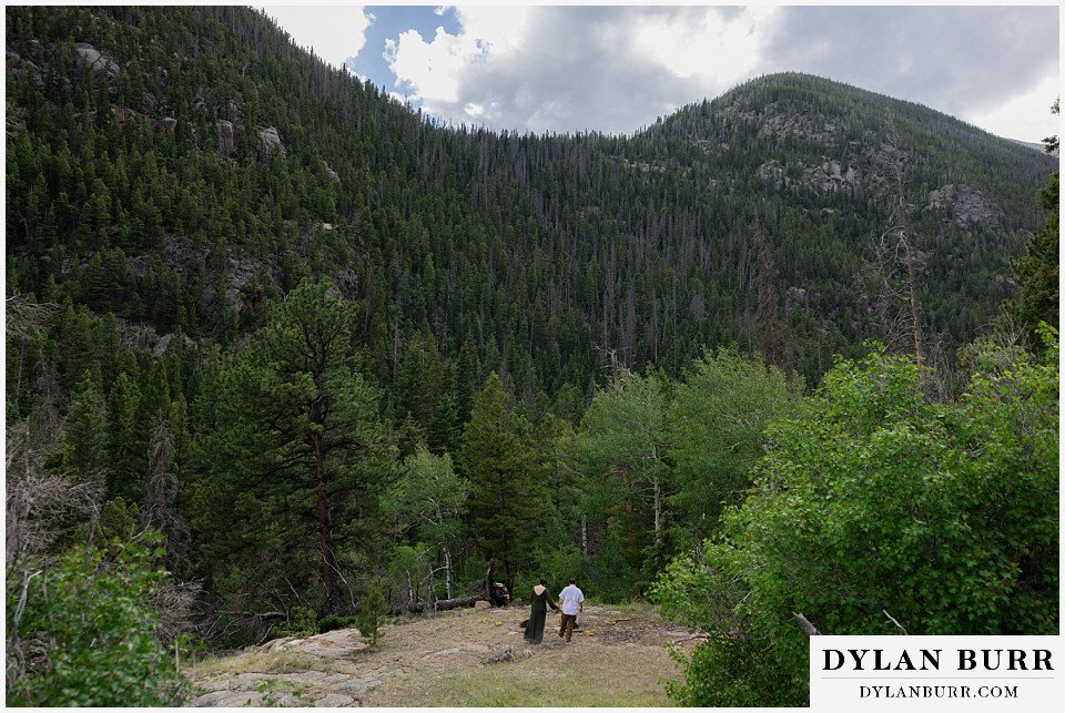 engagement session rocky mountain national park hiking with big mountains