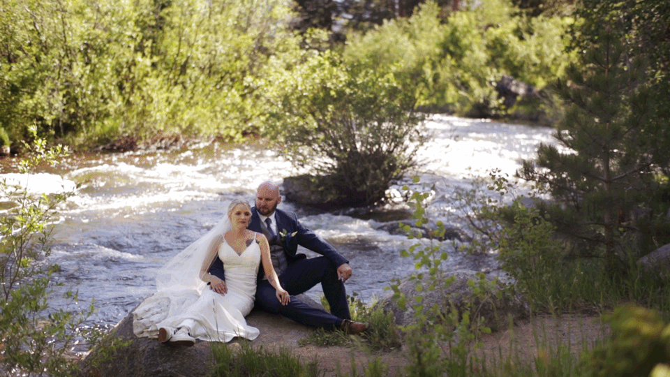 wild basin lodge wedding couple next to river cinemagraph