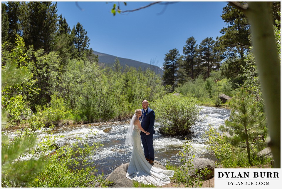 wild basin lodge couple together by the river