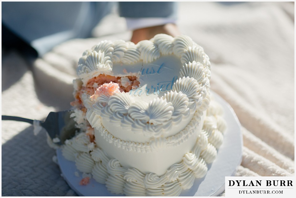 winter elopement wedding near winter park colorado just married cake
