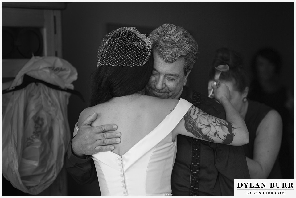 winter park mountain lodge wedding colorado brides father hugging bride