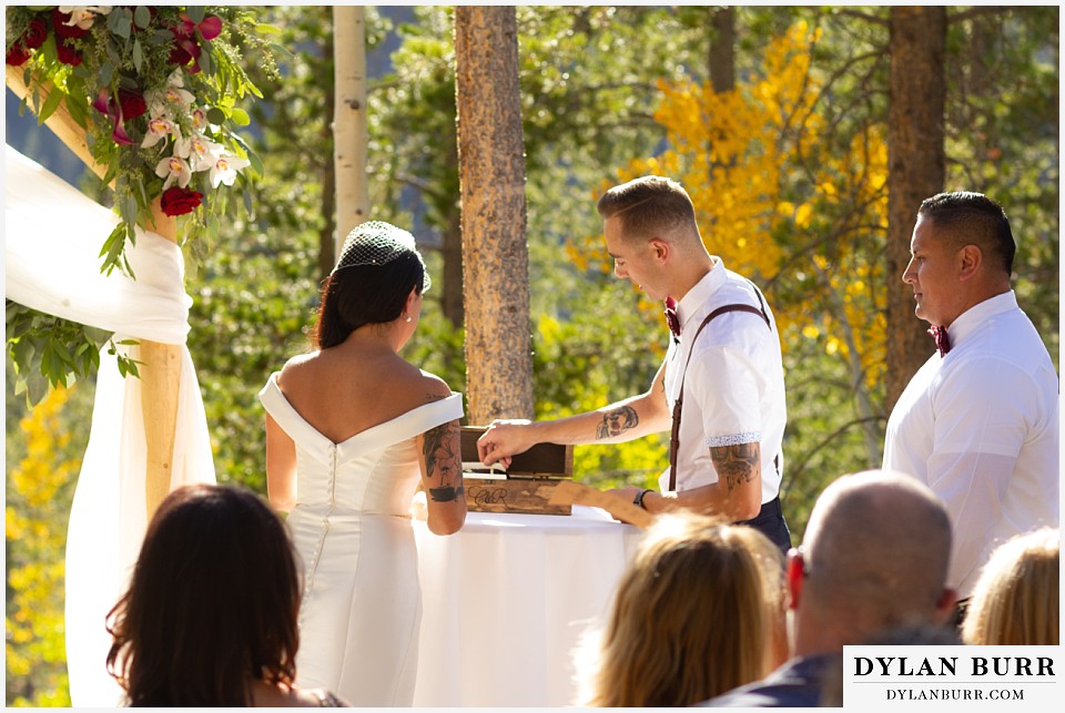 winter park mountain lodge wedding colorado filling keepsake box with letters