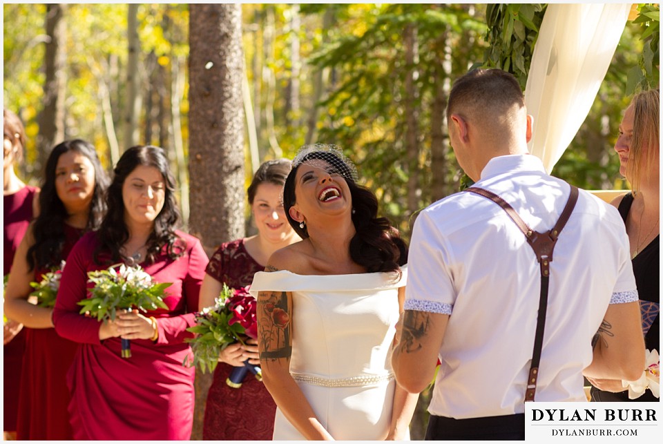 winter park mountain lodge wedding colorado bride very happy exchanging vows