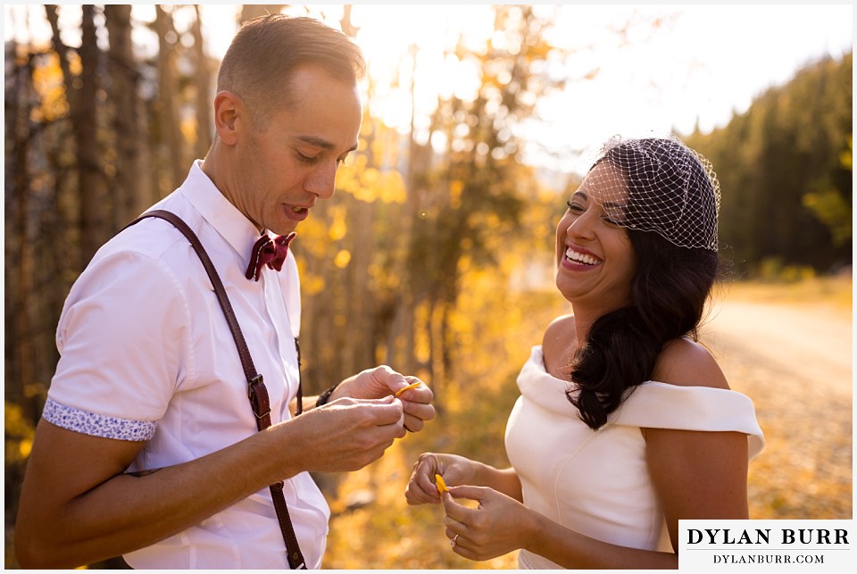 winter park mountain lodge wedding colorado bride and groom laughing together