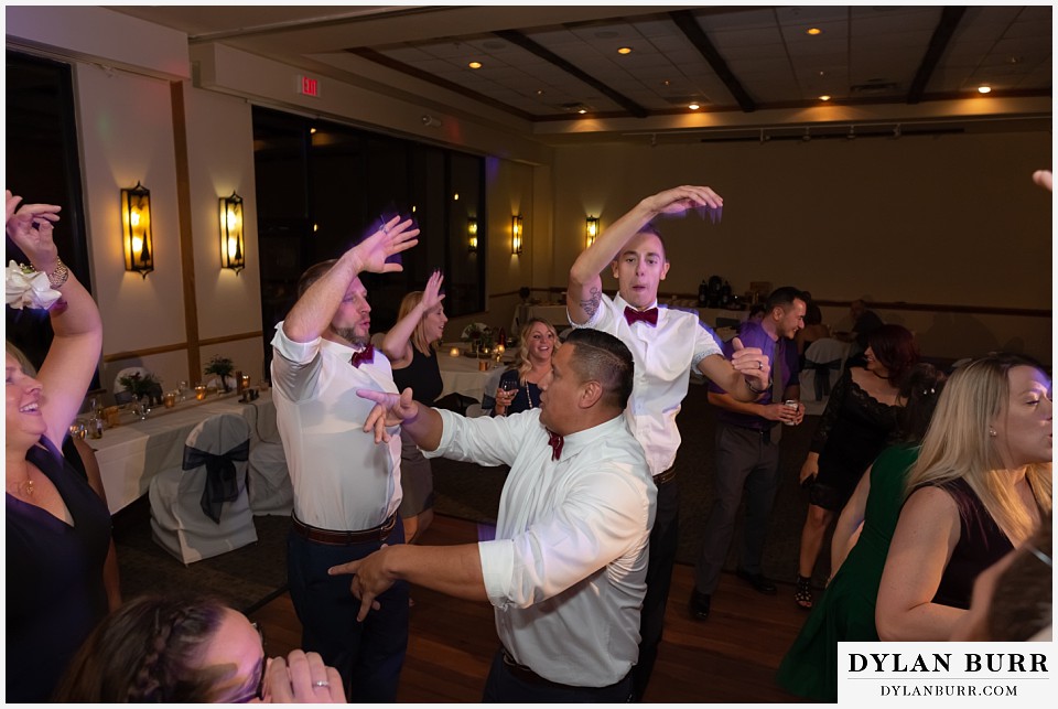 winter park mountain lodge wedding colorado groomsmen having fun