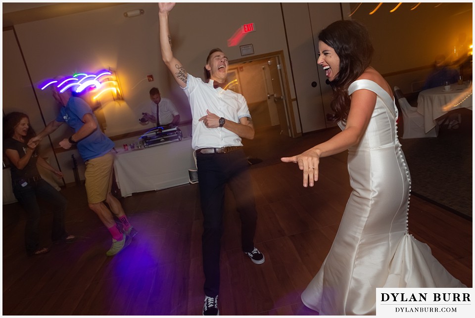 winter park mountain lodge wedding colorado reception party bride and groom singing loudly