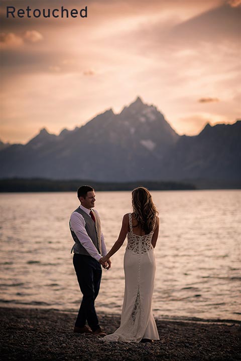 bride and groom walking lakeside at sunset in grand teton national park wyoming
