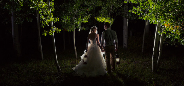 wedding-couple-lanterns-night-aspen-trees